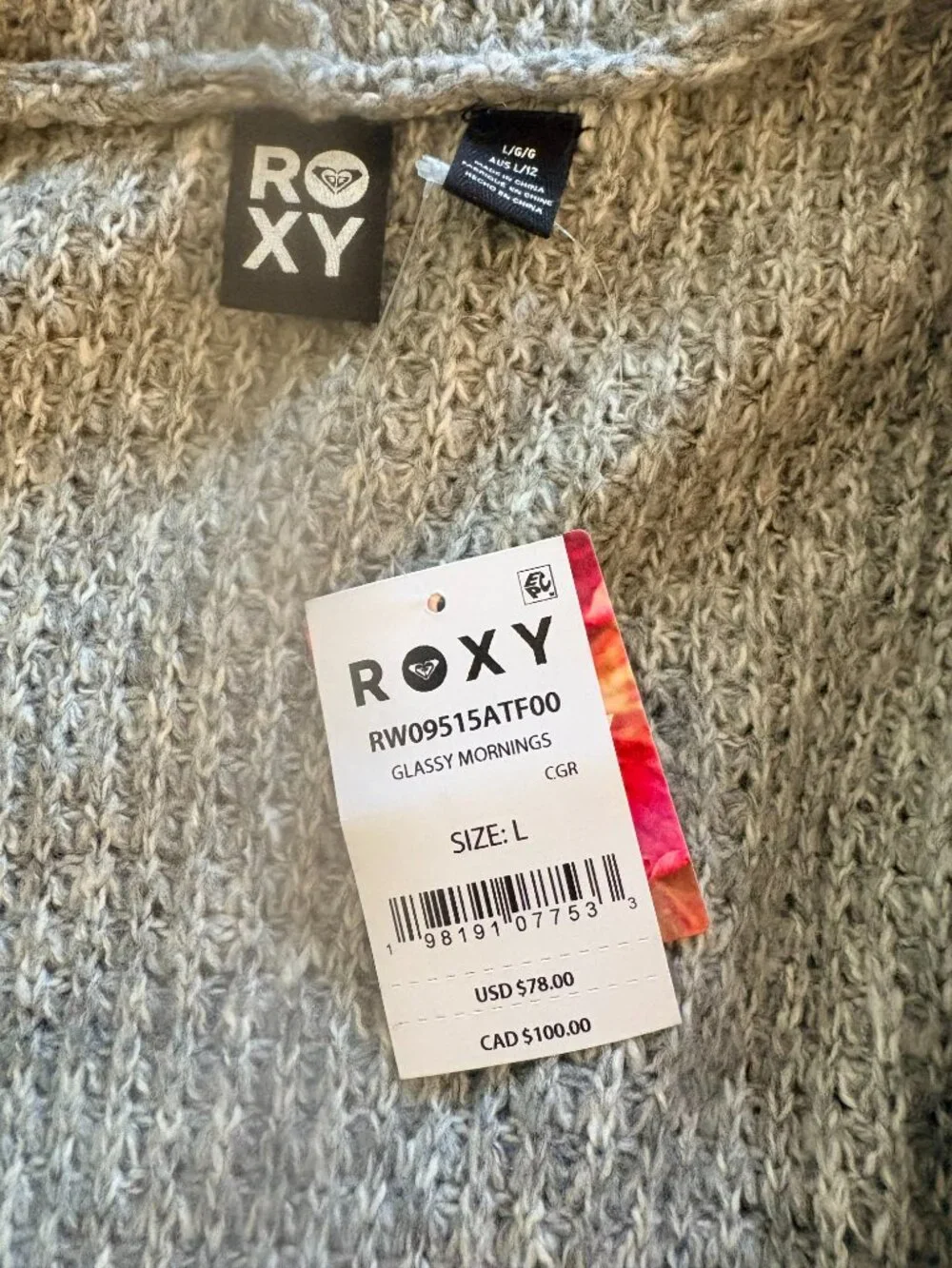 Grey Roxy Sweater with Zipper, Pockets, and Hood. Size Large. Retail $78.